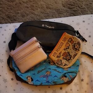 Therabody Black Waist Bag with Pink and Multicolor Pouches